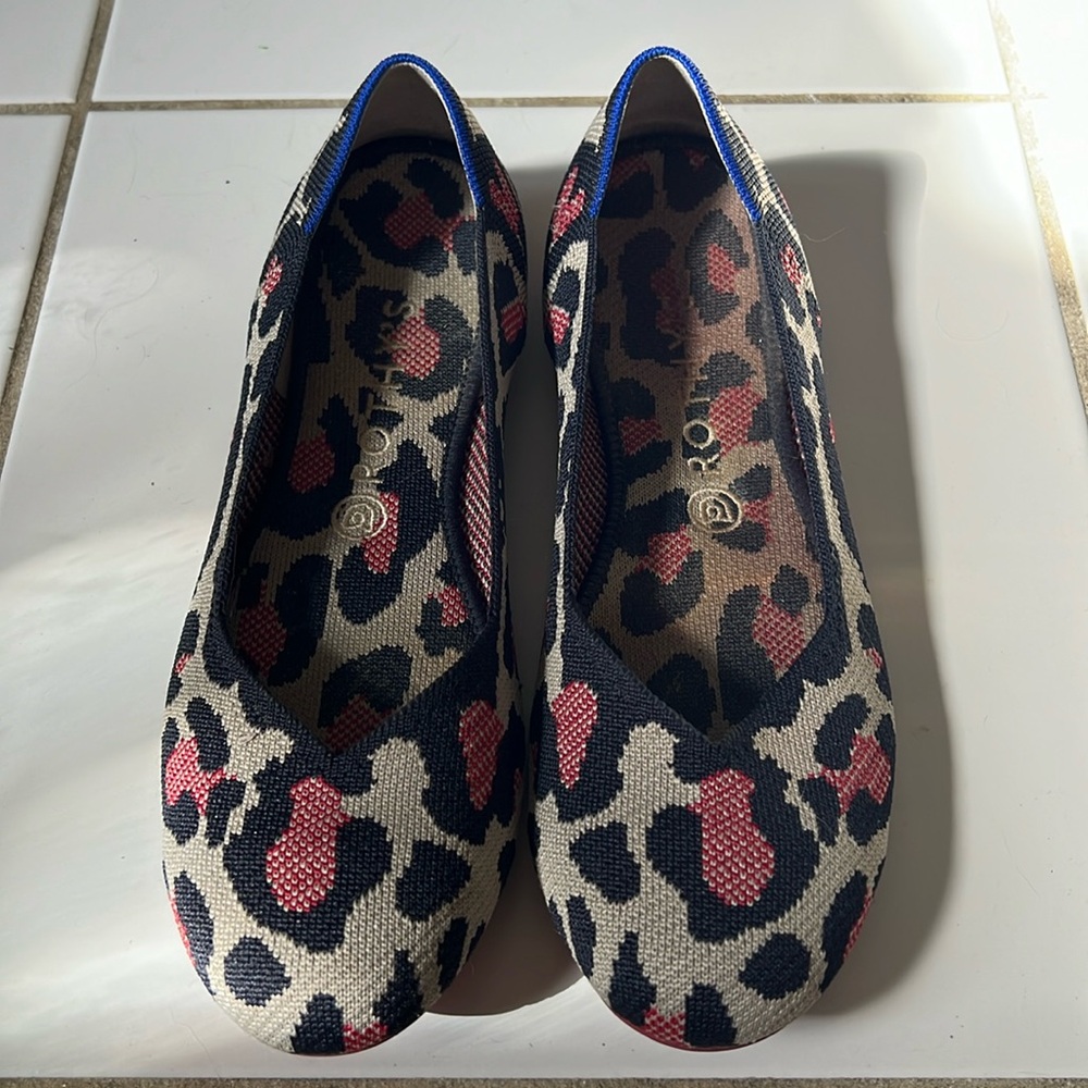 Rothys round toe animal print flats.